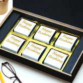 Choco 6pcs Birthday Box - Personalized Gift featuring six individually wrapped 'Happy Birthday' chocolates in a luxury black and gold box.
